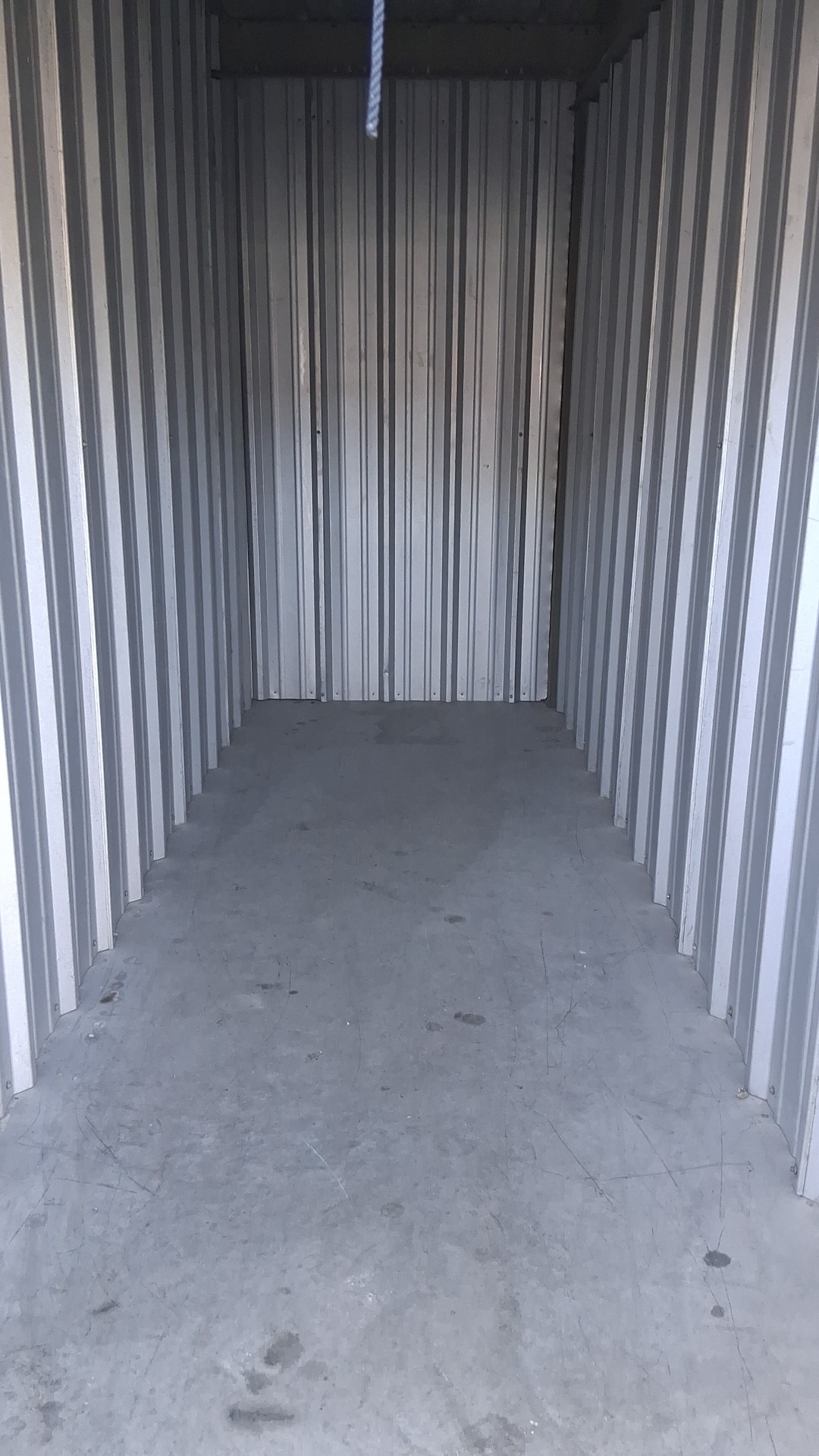 Storage unit completely cleared and swept clean after junk removal